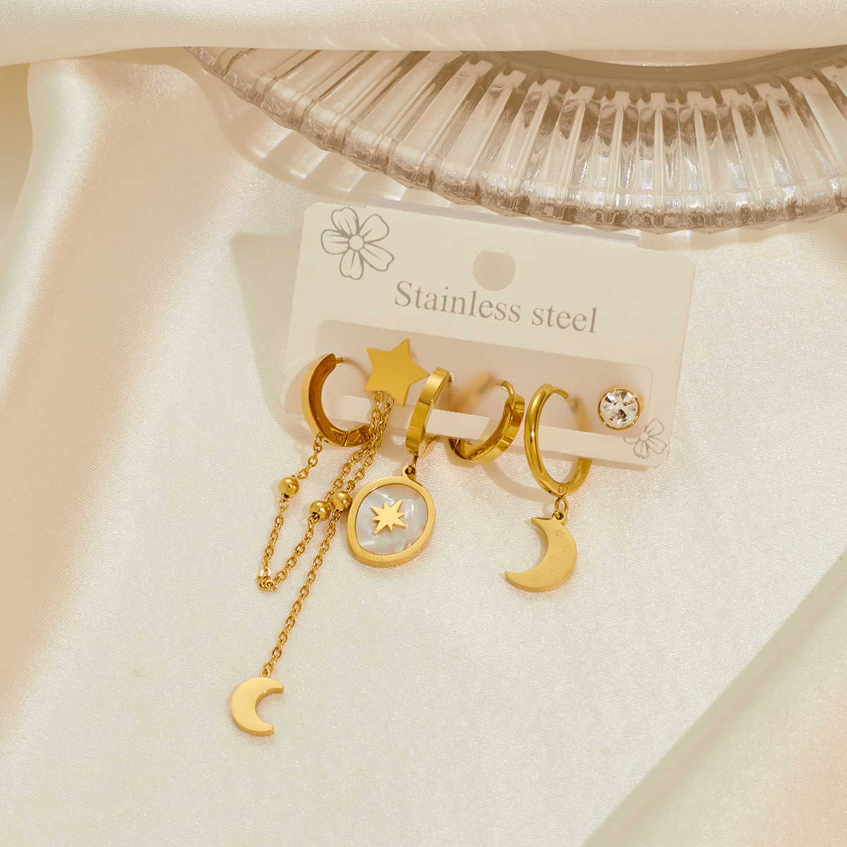 New titanium steel diamond-encrusted earring set, simple and fashionable hollowed-out star and moon drop earrings, women's factory wholesale Specification image