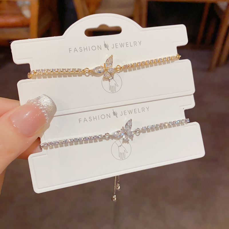 Wholesale of French light luxury, versatile, super shiny, full diamond butterfly bracelet with pull-out style, exquisite and fashionable design sense