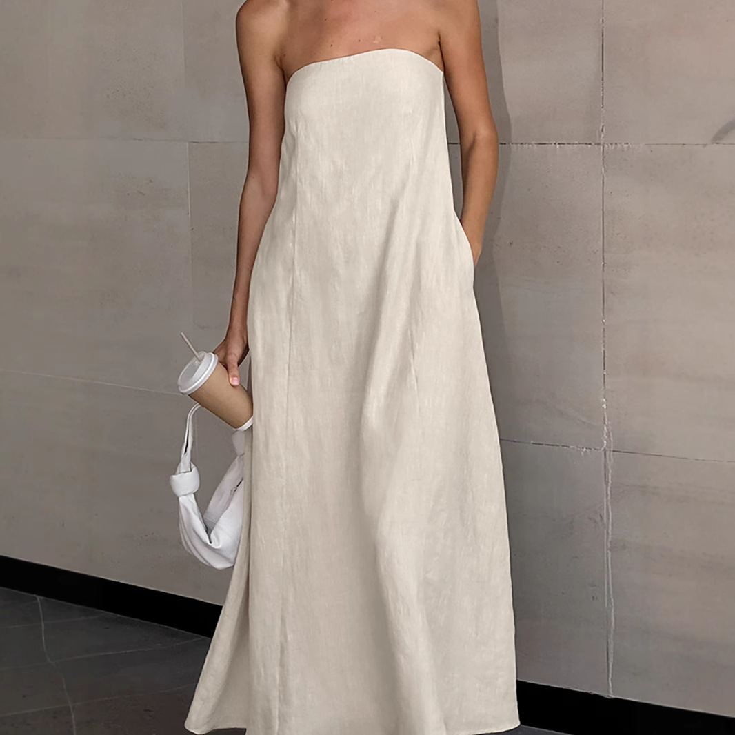 A simple and stylish European and American design dress, a new cross-border slimming and elegant strapless solid color long dress for women in 2025 full figure