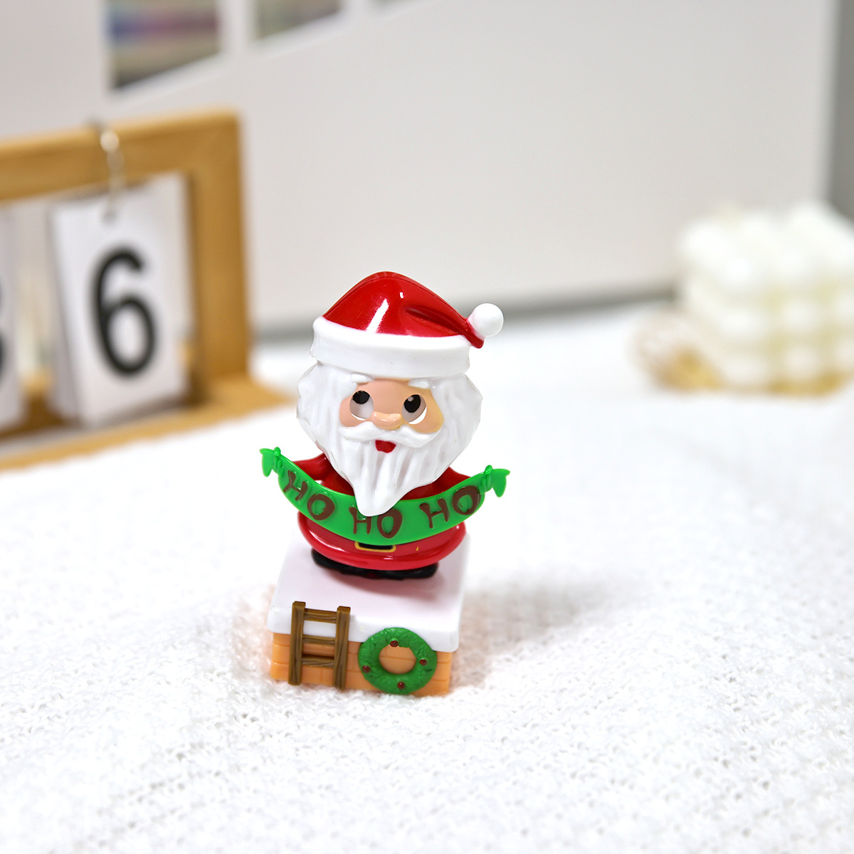 Cross-border new product Santa Claus HOHOHO green banner solar automatic rocker is available for wholesale and consignment