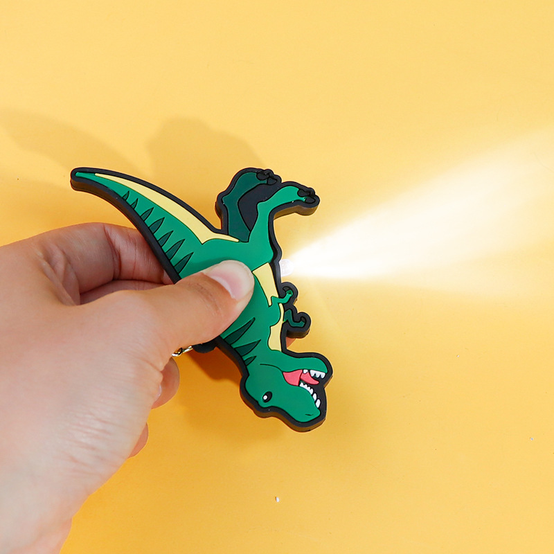 New dinosaur series keychain, creative dinosaur lamp portable bag, dinosaur small spotlight wholesale pendant Application Scenario