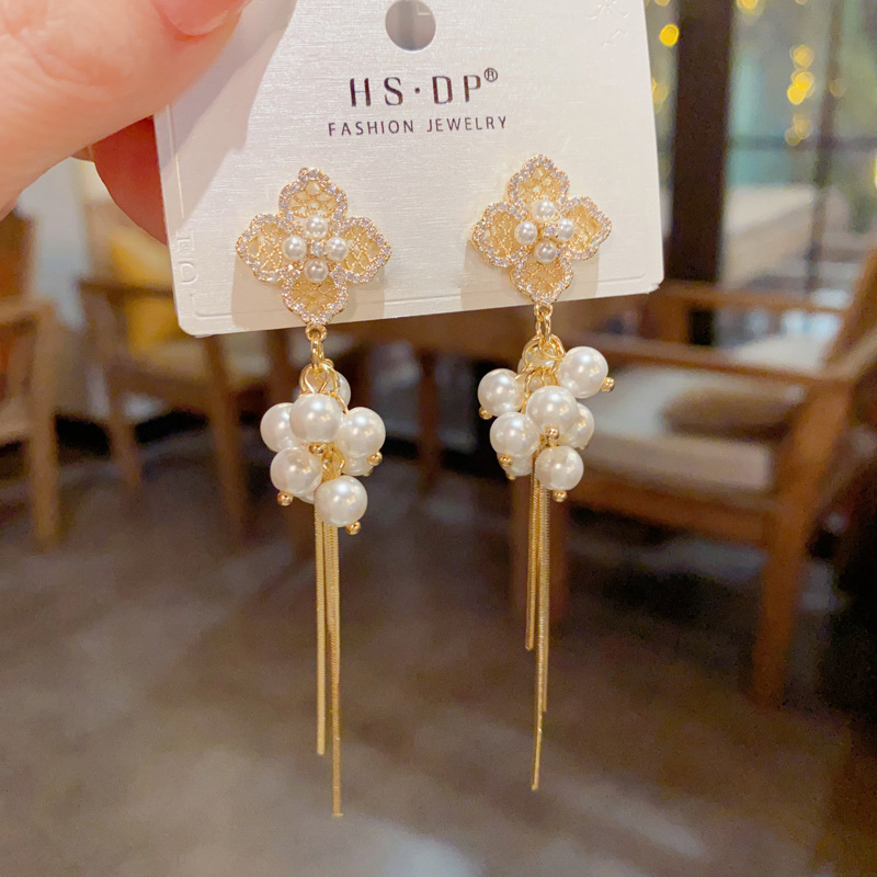 Wholesale of French light luxury zircon four-leaf flower pearl long tassel earrings with a unique, fashionable, simple and high-end feel details Picture