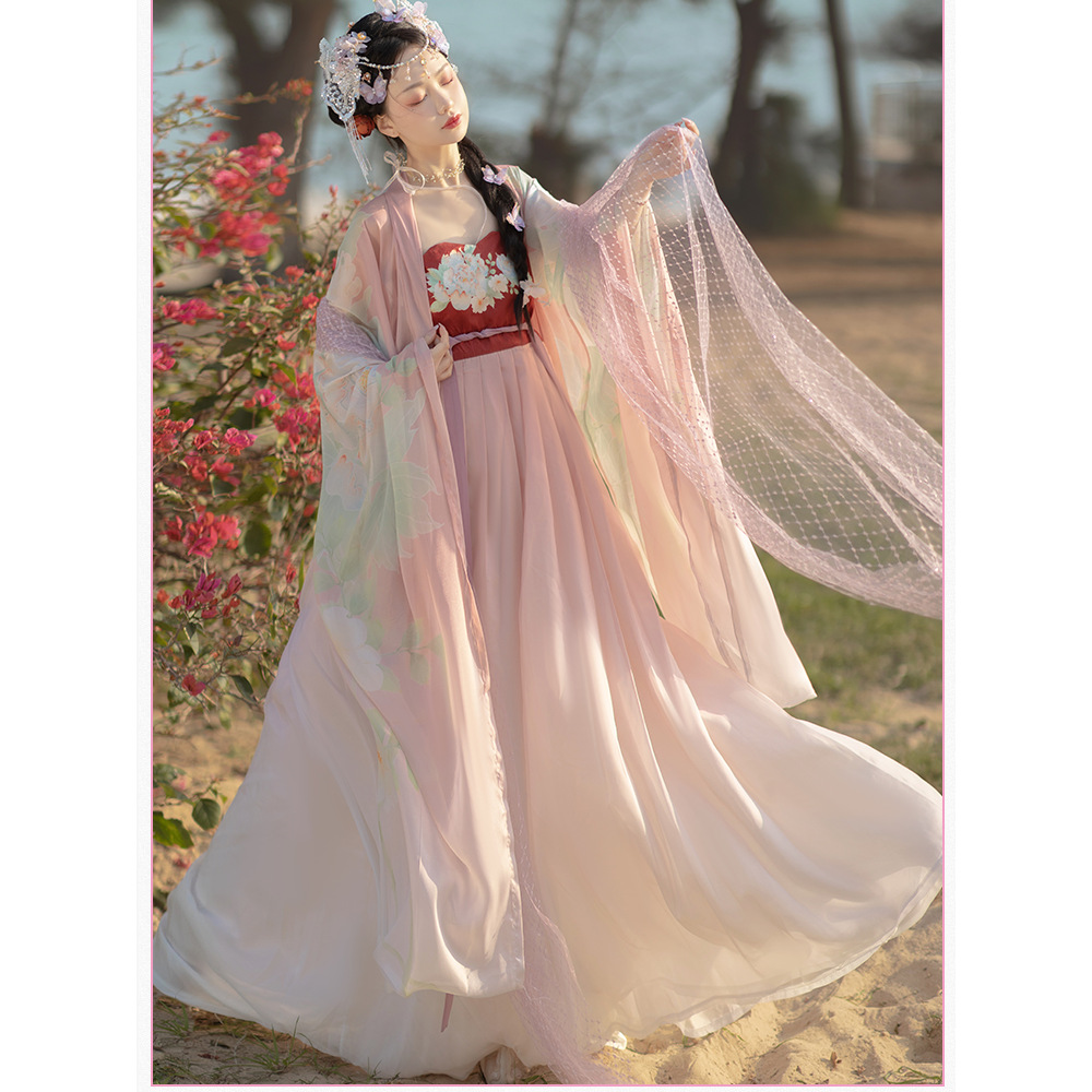 The new large-sleeved blouse and skirt with Tang-style prints for women in summer, featuring a Chinese style