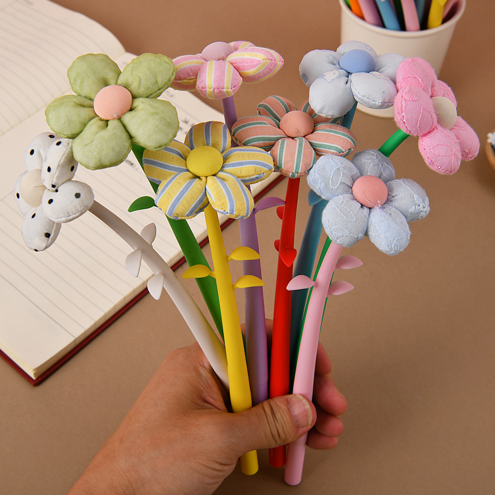 The new flower-shaped soft gel gel pen is cute and colorful with small flowers. It features a high level of appearance, a rocking pen, a signature pen and a water-based pen Specification image