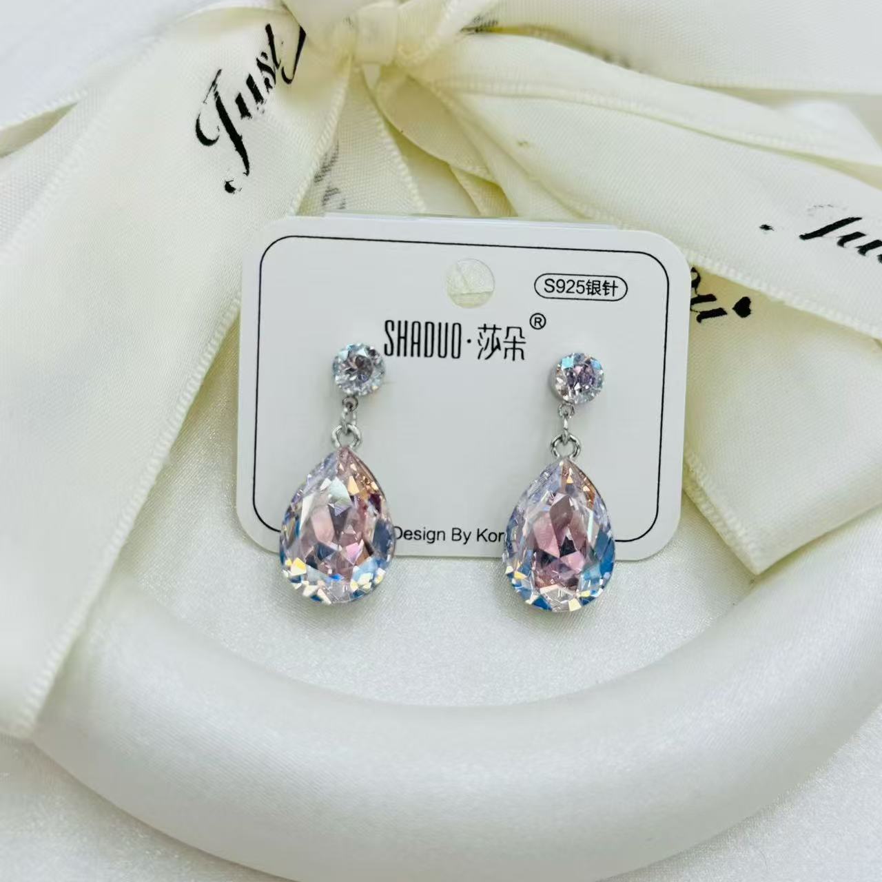 S925 aguja de plata gota de agua forma huazi pendientes para mujeres austria cristal orejas versión coreana simple temperamento versátil pendientes