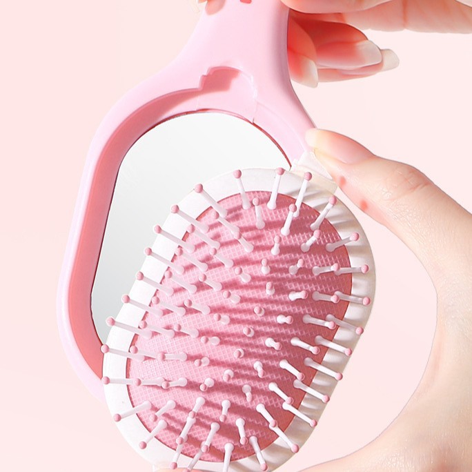 Hello Kitty粉红苹果迷你折叠梳子可爱气垫梳气囊梳便携镜梳一体细节图