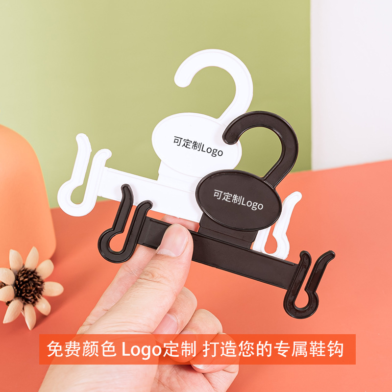 拖鞋挂钩浴室商场展示人字托塑料挂勾架挂鞋子架子棉拖晾晒钩子产品图