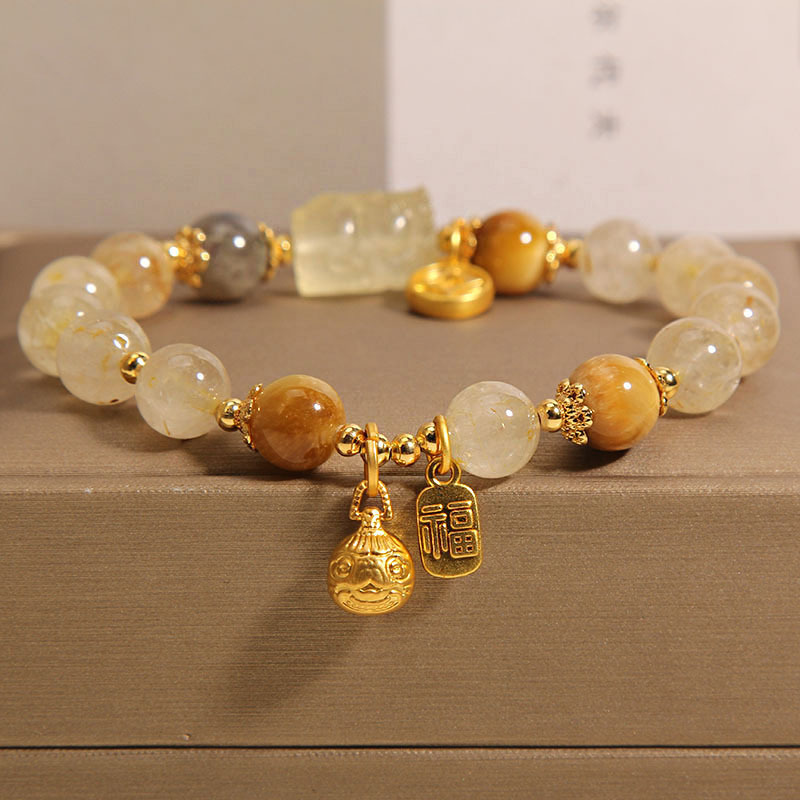 Natural gold rutile crystal moonstone bracelet, female gold-swallowing beast yellow tiger's eye yellow rutile bracelet for your girlfriend and best friend Specification image