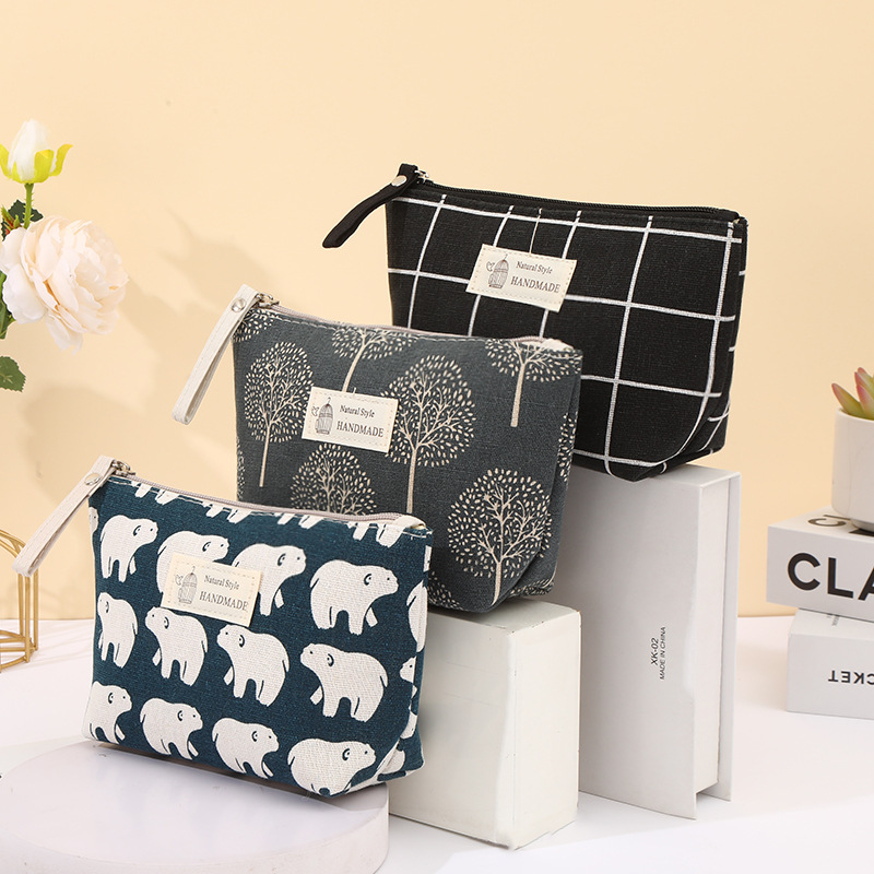 跨境现货布艺化妆包拉链袋多功能便携式收纳手拿洗漱包学生笔袋产品图