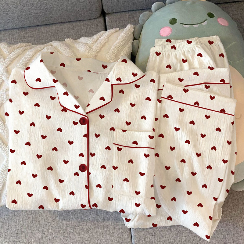 Gentle style girl's heart-shaped cardigan pajamas can be worn outside. Spring new wrinkled fabric home wear long-sleeved set wholesale details Picture