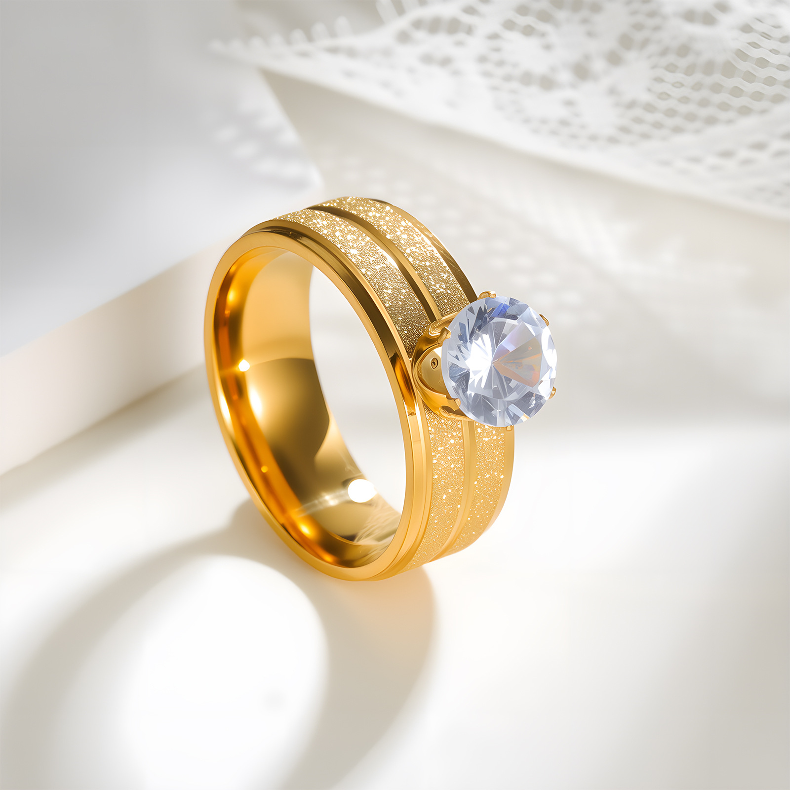 Cross-border European and American stainless steel jewelry, six-prong zircon women's ring, stainless steel electroplated with gold matte finish, 8MM wide details Picture