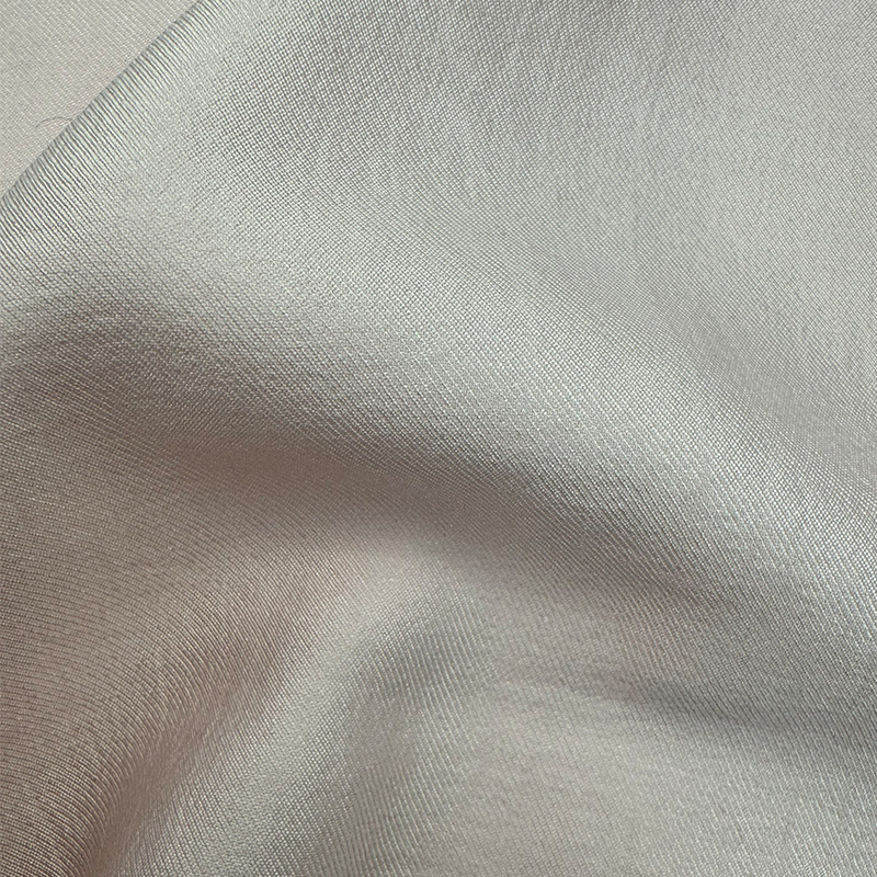 仿醋酸亮光斜纹面料 人棉锦纶涤纶混纺 挺括感 蓬蓬裙专用时装布