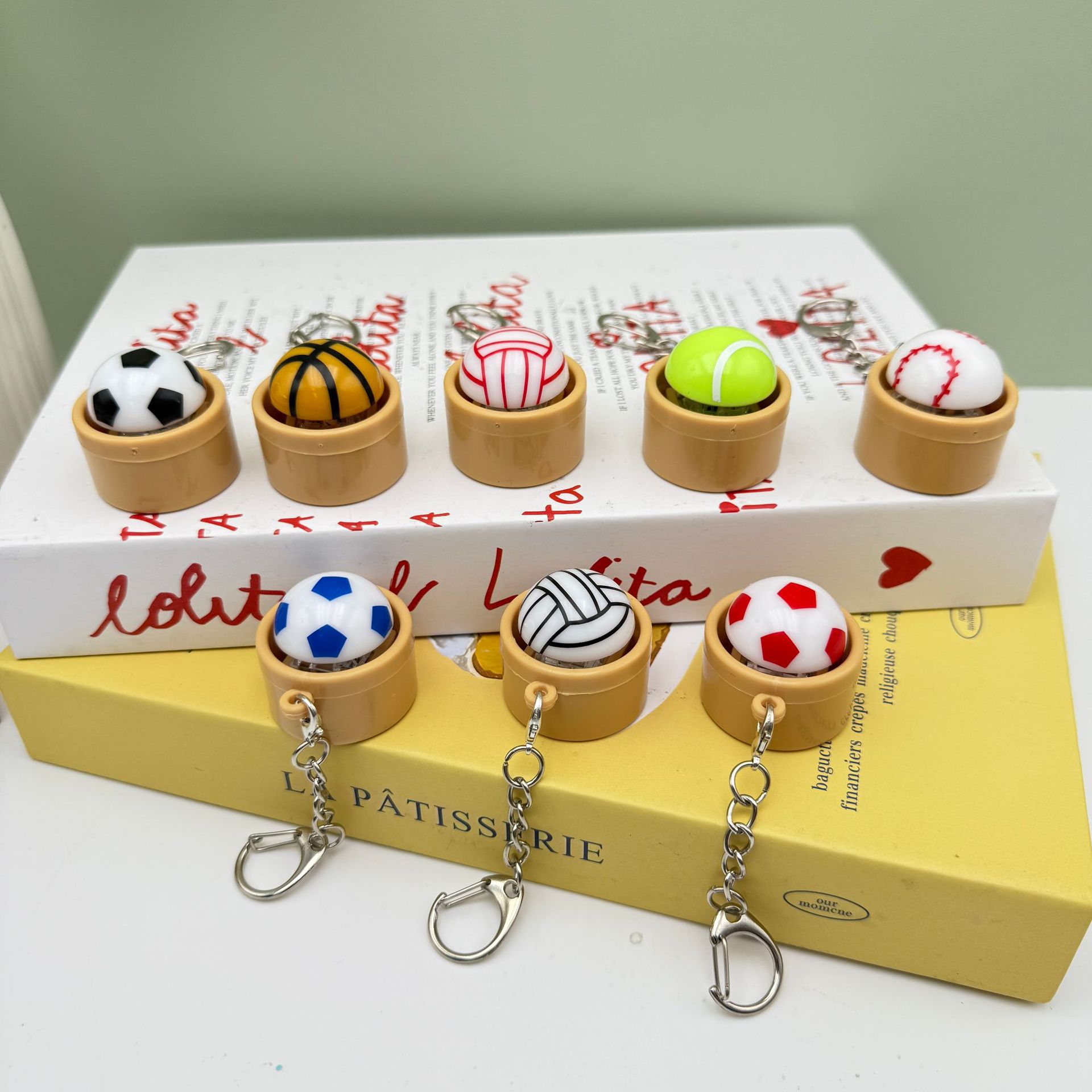 Cross-border stress-relieving buttons, football, basketball buns, softball, tennis, volleyball, stress-relieving buttons, toys, keychains details Picture