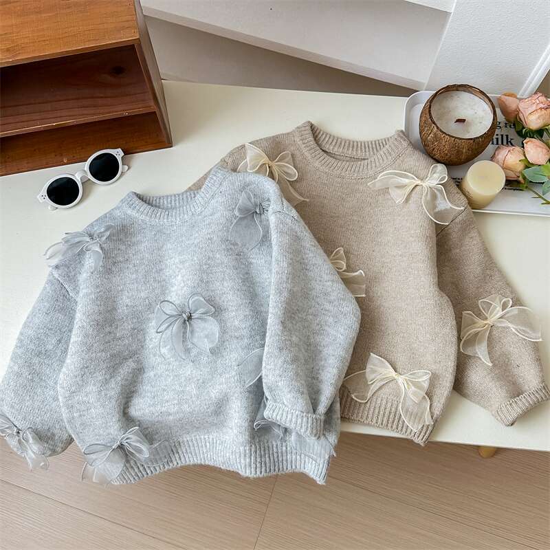 Tongxingyuan Korean children's sweater Spring and Autumn New Style stylish girls' Korean-style children's bow knitted sweater details Picture