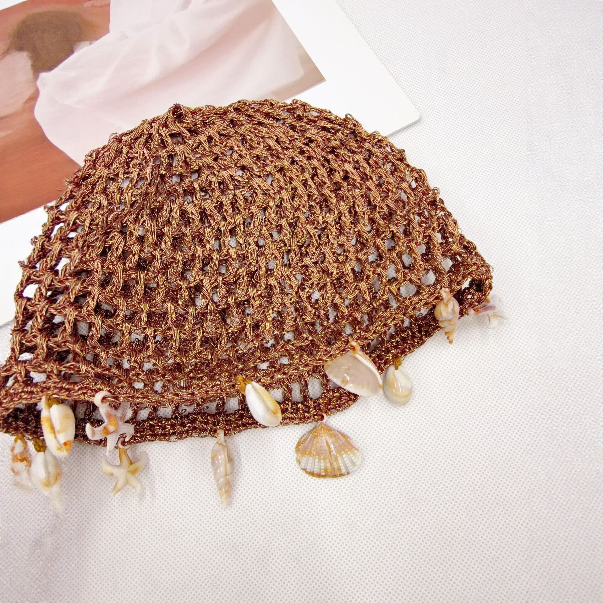 Handcrafted crochet hollowed-out shell decorated headpiece hat for women, spring and summer breathable fisherman's hat, fashionable and versatile knitted hat Application Scenario