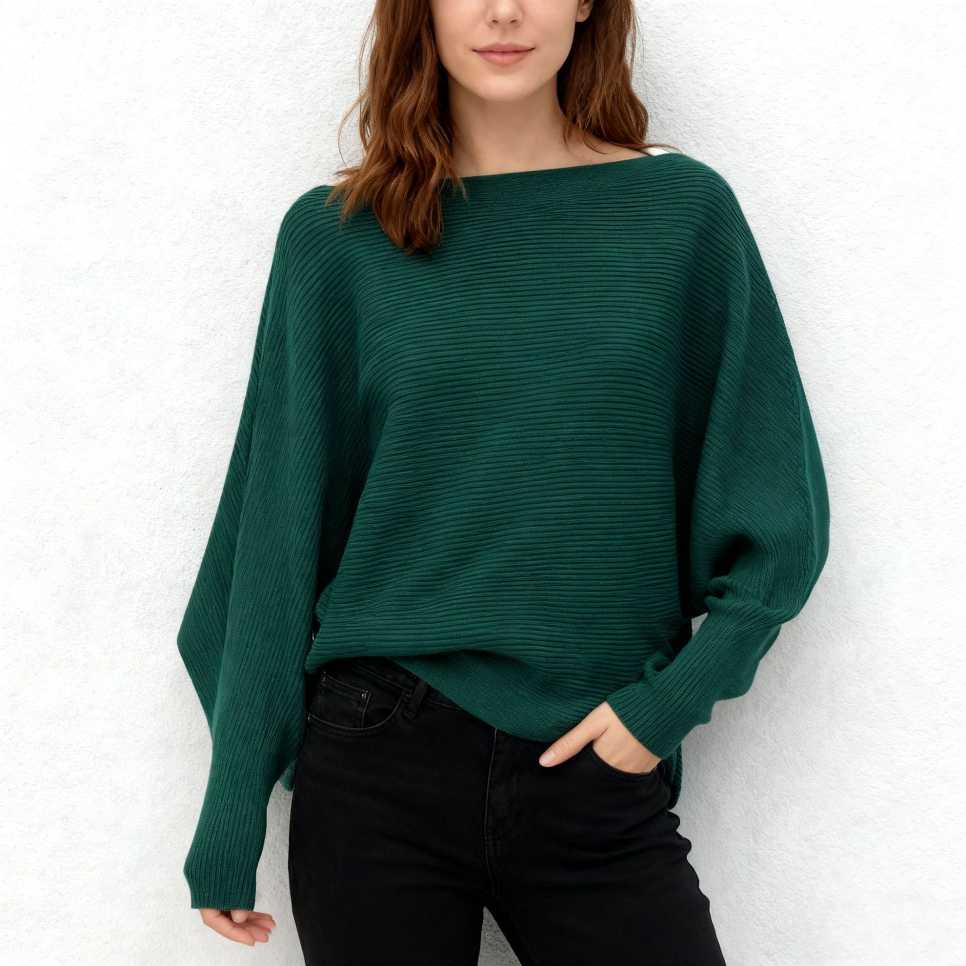 A loose knitted sweater with a one-shoulder collar and bat sleeves in stock. It's a great recommendation for women. You can come and buy it