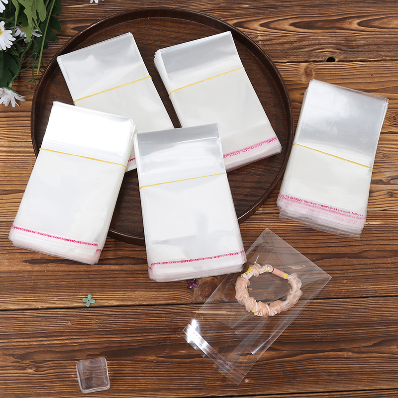 热销opp平口袋透明包装袋无封口塑料袋食品级糖果玩具饰品扎口袋