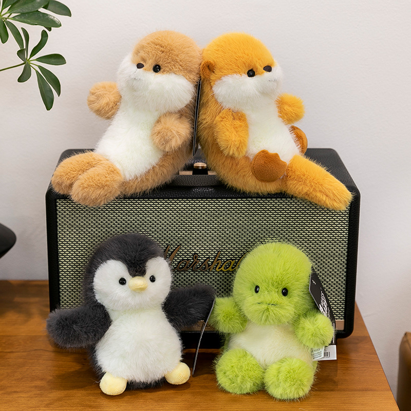 Wholesale of creative new puff series plush toys, seal and penguin animal figurines, children's gifts, and doll table companions details Picture