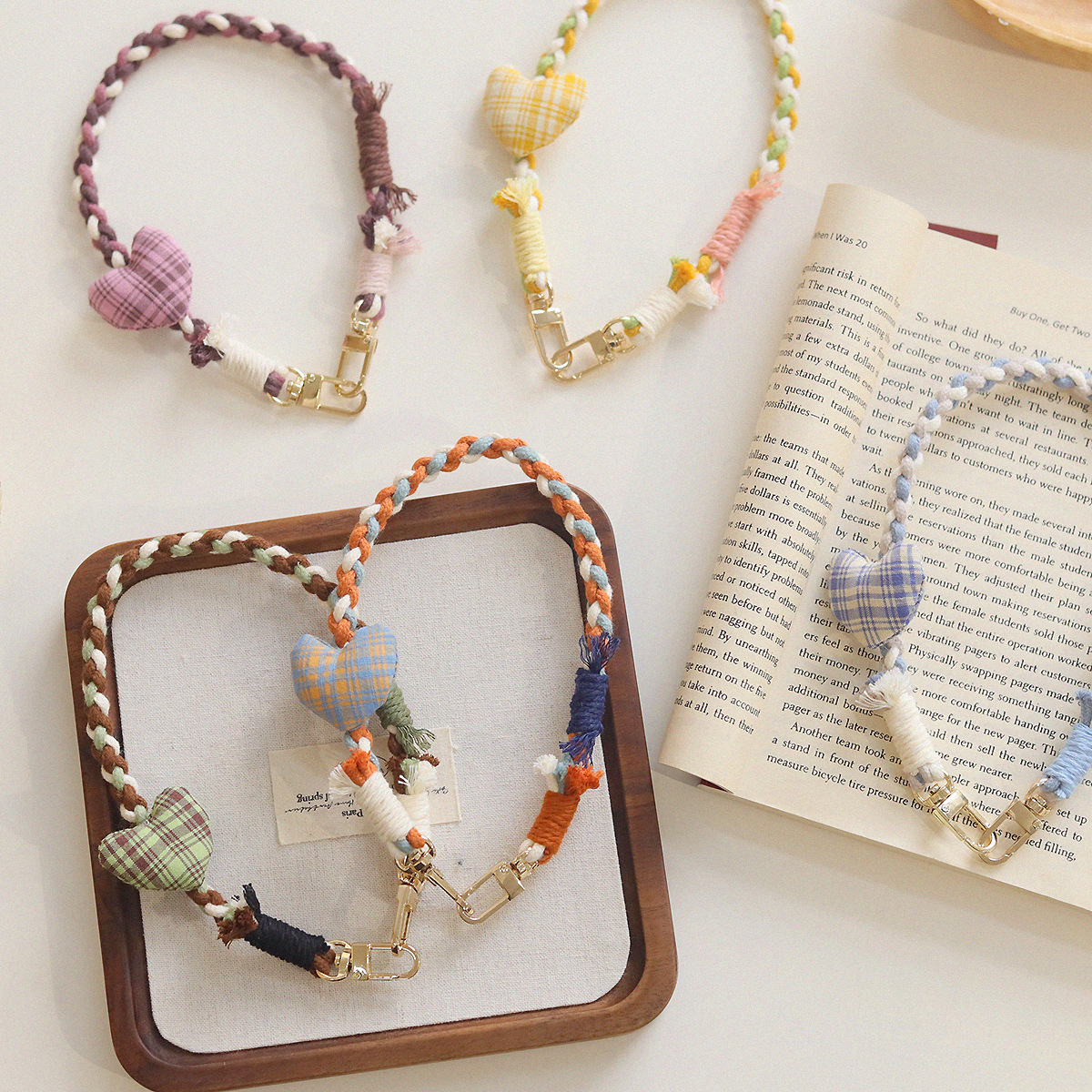 Korean-style ins checkered fabric heart-shaped hand-knitted mixed thread mobile phone lanyard, diagonal long rope shoulder strap, cross-chain twisted rope wrist Application Scenario