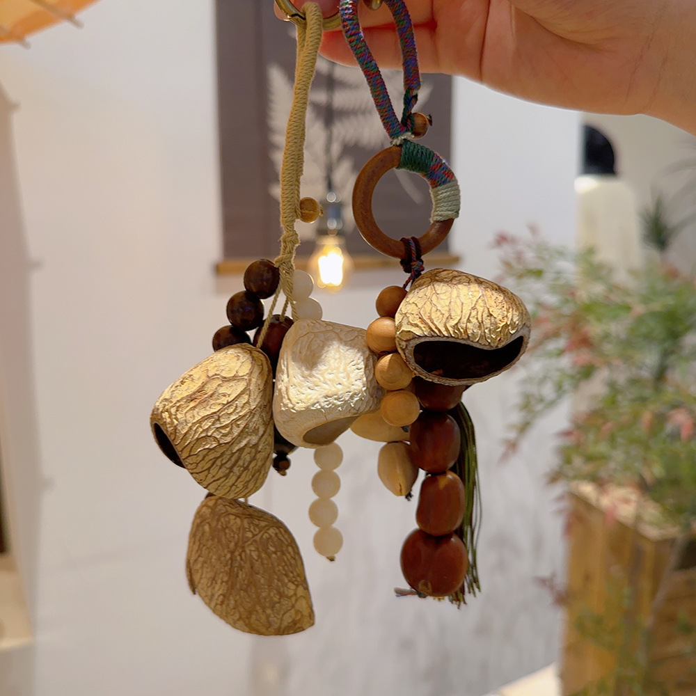 Natural fruit shell wind chime pendant, forest-style plant healing bell, full wish seed string, stress-relieving sound therapy bag, car pendant