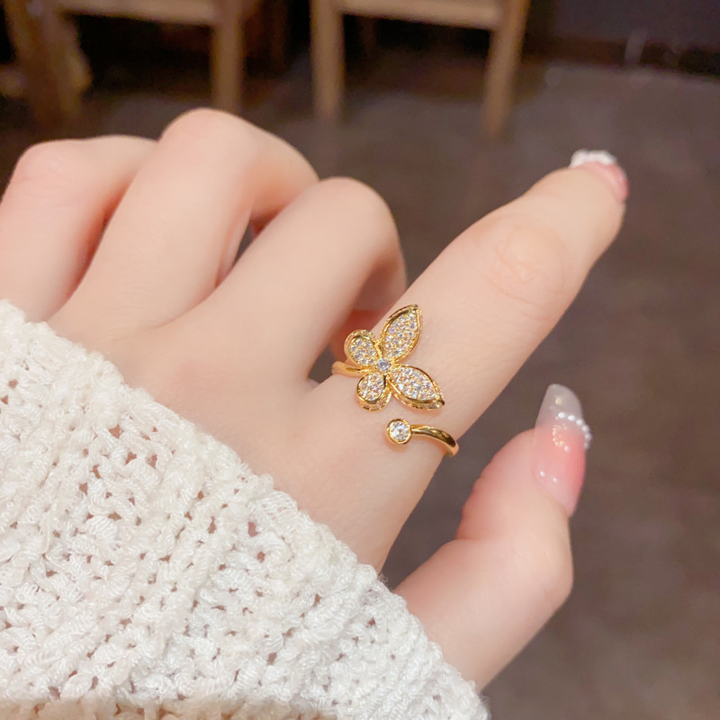 The new summer collection features a minimalist micro-inlaid zircon butterfly open-mouth ring with a unique and fashionable design. It is a versatile index ring that pairs well with accessories details Picture