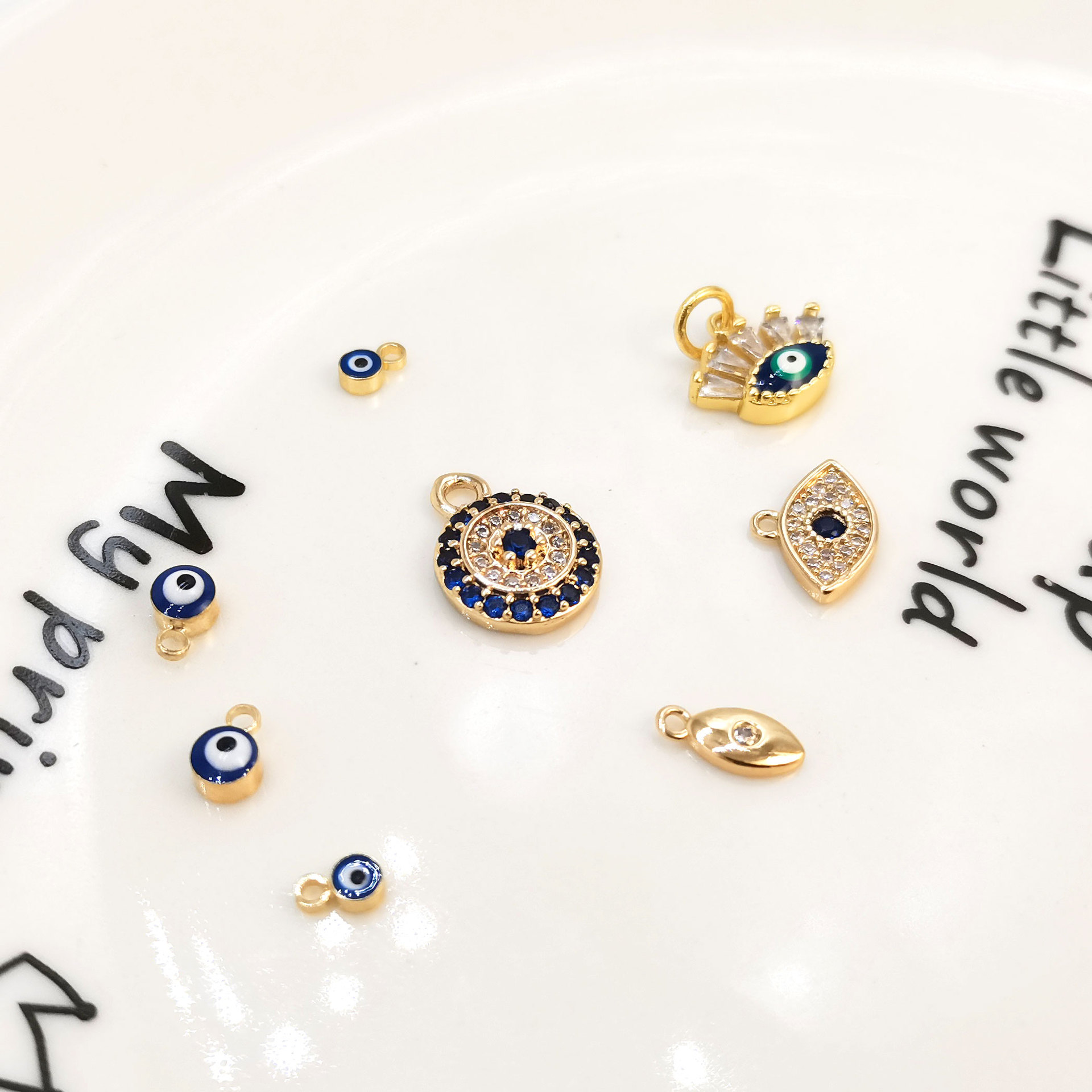 Cross-border new Devil's Eye series brass gold-plated oil drip and diamond-encrusted hip-hop style blue eye necklace accessory bracelet