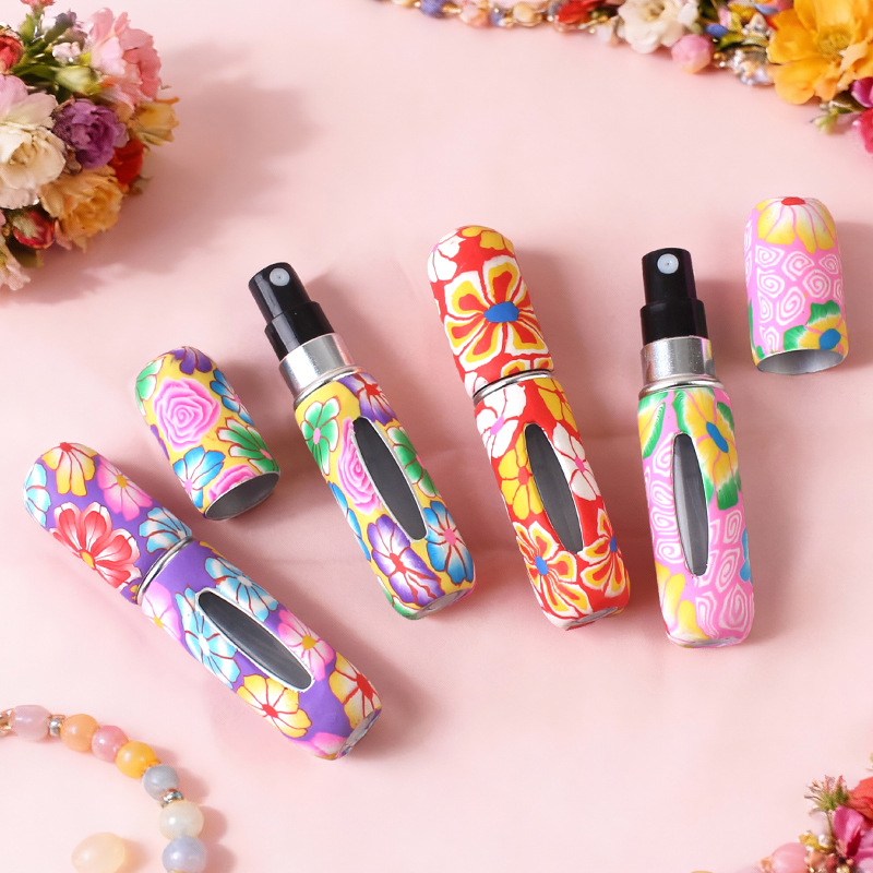 A new cross-border 5ml perfume dispenser bottle made of soft clay, portable, with a direct bottom filling and self-pumping press-type spray bottle details Picture