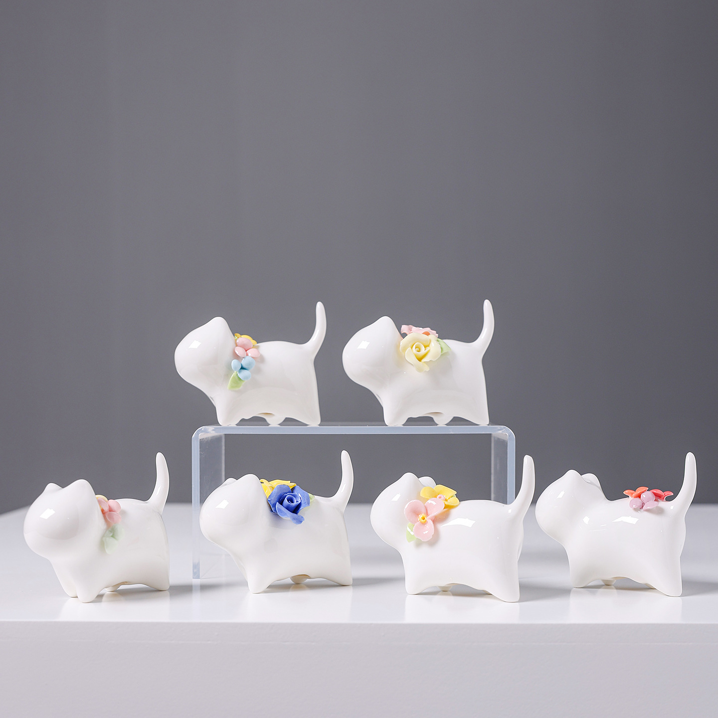 2026, a creative home tabletop decoration ceramic flower arrangement featuring hand-molded miniature cats in a jade-like white color