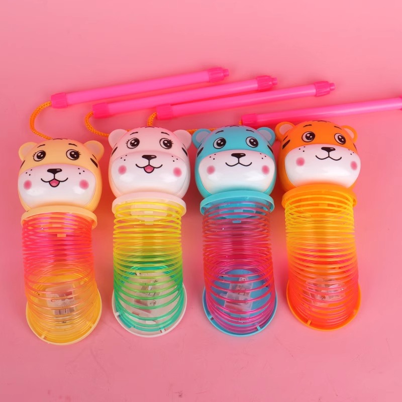 Creative cartoon illuminated lanterns for the Year of the Tiger, illuminated projection lanterns, hand-held rainbow rings, spring rings, street toy supplies Application Scenario