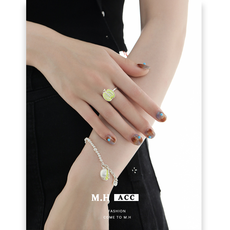 A sweet and cool, unique and original design of the green apple ring for women. Adjustable index finger ring details Picture