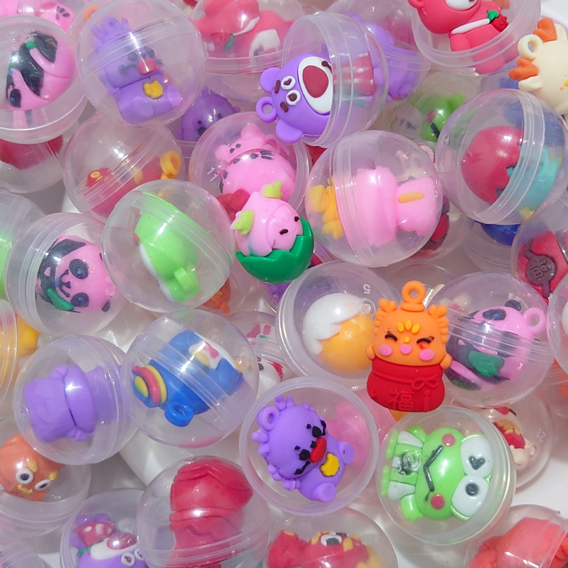 32mm透明公仔扭蛋玩具一元投币游戏扭蛋机弹力球扭扭蛋球批发