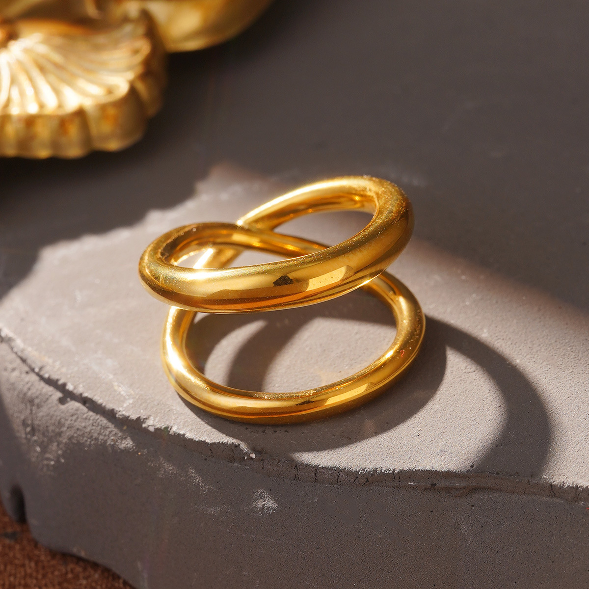 European and American fashionable stainless steel rings with hollowed-out, niche wide lines, high-end design sense, and gold jewelry wholesale Specification image