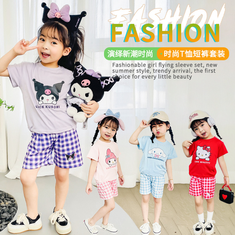 The new summer cartoon multi-color loose T-shirt and checked shorts set for girls is cute and trendy. It's a two-piece short-sleeved top