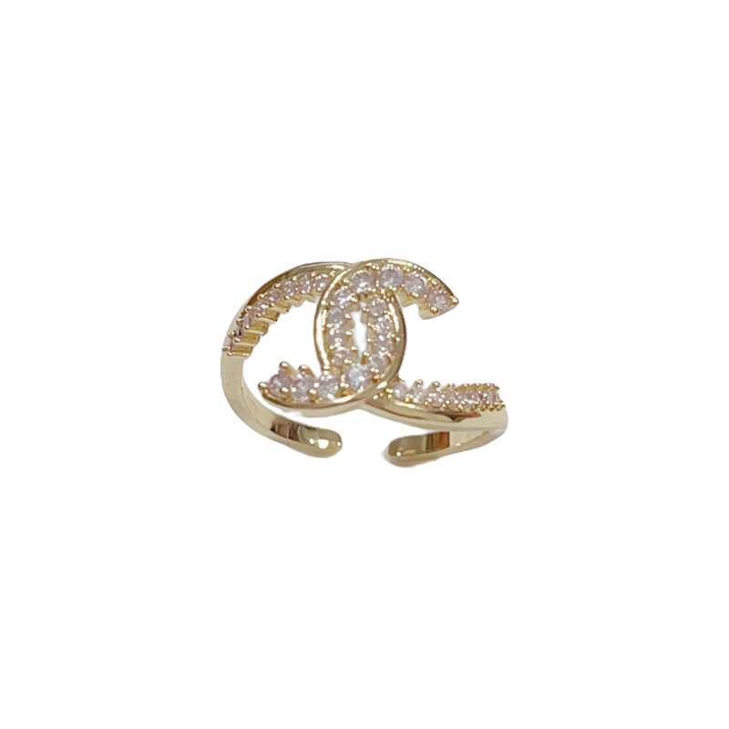 This is a new summer fashion Chanel style full-diamond letter open-mouth ring with a unique, light luxury, versatile and super shiny design Application Scenario