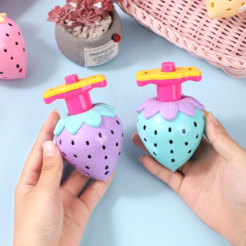Strawberry luminous rotating gyroscope, bright light emission, high-speed gyroscope, ejection gyroscope, nostalgic student gift, children's toy Application Scenario