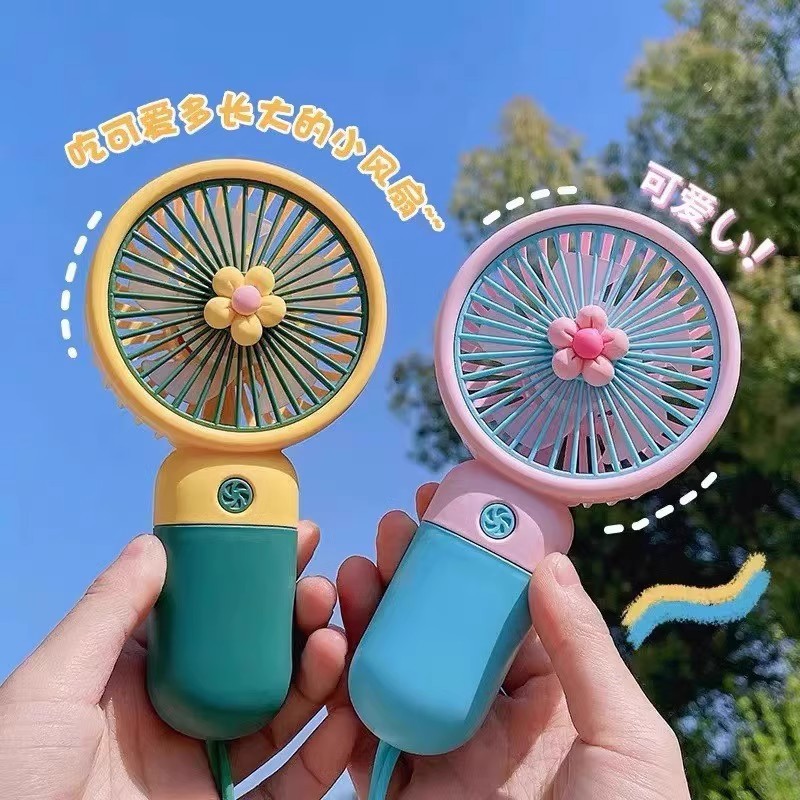 Handheld portable mini fan with dry battery, a cooling wonder details Picture