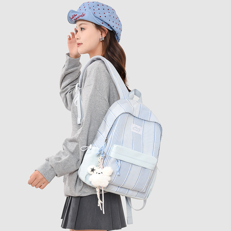 The 2026 new Japanese-style girlish checkered backpack is lightweight and has a large capacity. It is a versatile and cute student backpack details Picture