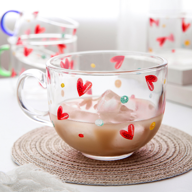 Transparent glass cups with creative heart-shaped milk breakfast cups, office household tea cups, and water cups with handles Application Scenario