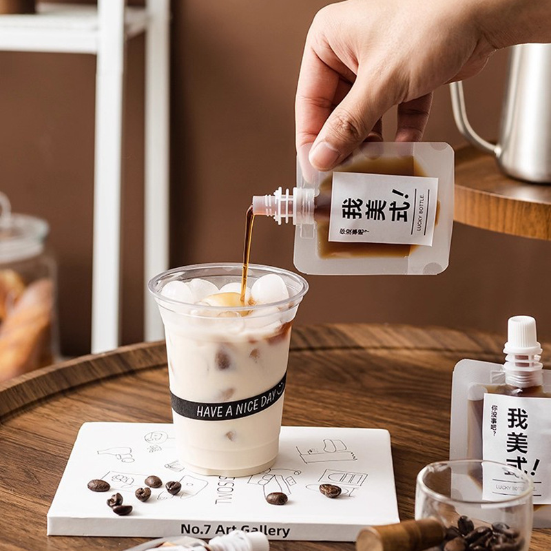 Transparent frosted disposable cold brew ice drop packaging bag for espresso liquid, sealed liquid suction nozzle bag Application Scenario