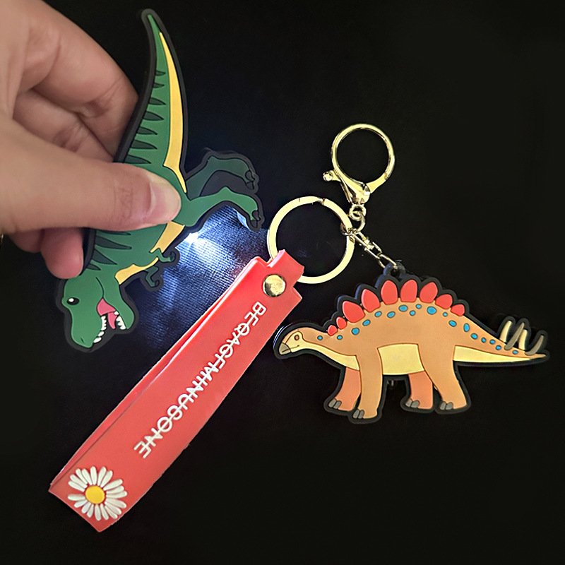 New dinosaur series keychain, creative dinosaur lamp portable bag, dinosaur small spotlight wholesale pendant details Picture
