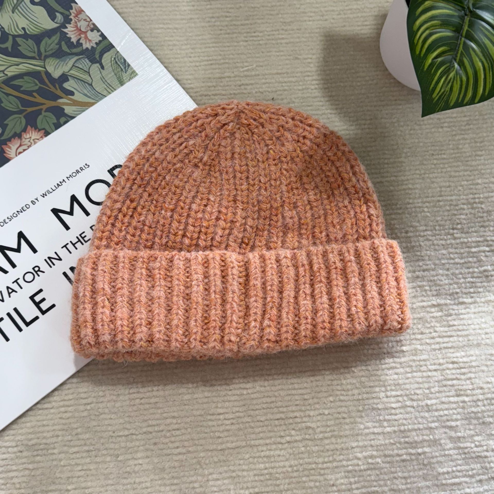 A new style of loose, large-head knitted pile cap for men and women to keep warm in autumn and winter, a woolen cap with ear protection, and a versatile cold hat Specification image