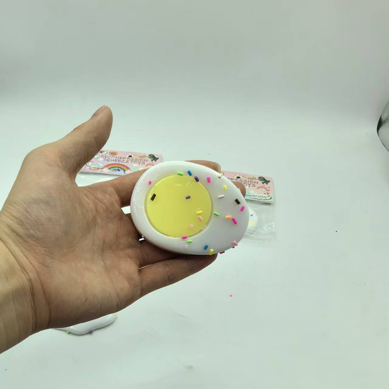 Direct sales from the manufacturer of children's stress-relieving toys, including the "Vent Squeeze Fun" card head simulation poached egg PVC bag Application Scenario