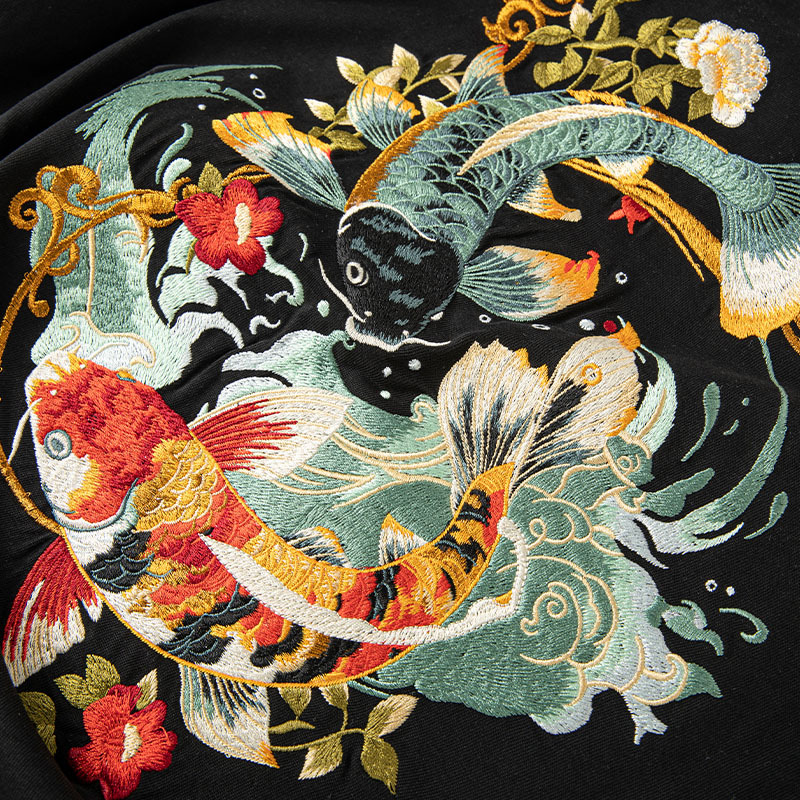 The 2026 summer new short-sleeved T-shirt for men features summer embroidery with blooming flowers and koi fish, presenting a strong national trend and a loose Chinese style details Picture