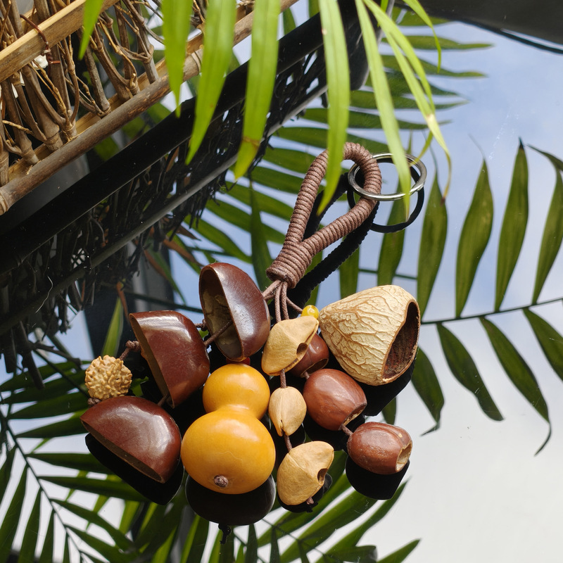印尼植物果壳手摇铃风铃串手工制作果壳包包挂件木质车挂钥匙扣