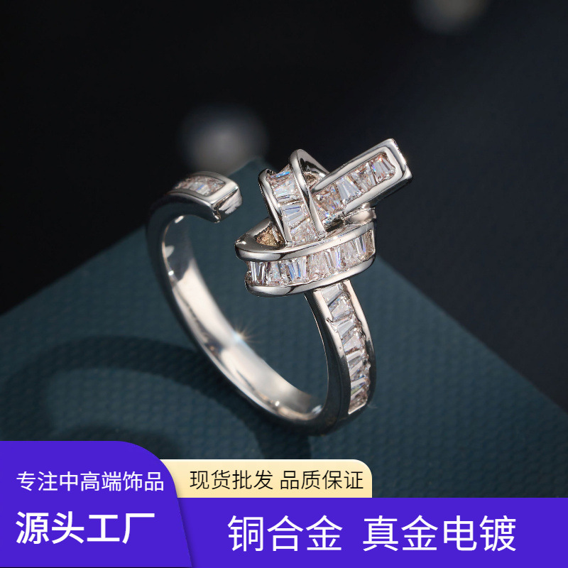 Origen fábrica de lujo ligero sensación avanzada cuerda nudo anillo de apertura aleación de cobre oro verdadero chapado con zirconia anillo de dedo índice ajustable