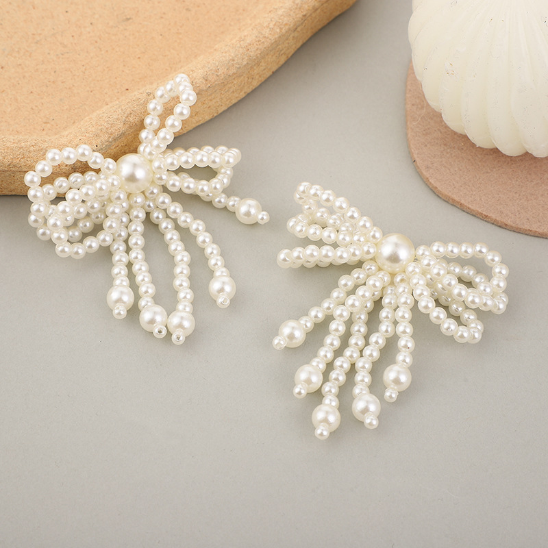 Factory wholesale of hand-woven pearl hair clips, material accessories, hand-sewn bow pendants, corsage accessories and accessories details Picture