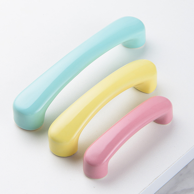 Ceramic handle, cartoon, simple, children's room wardrobe, door handle cabinet, kitchen cabinet, shoe cabinet door handle, double-hole distance large handle Application Scenario