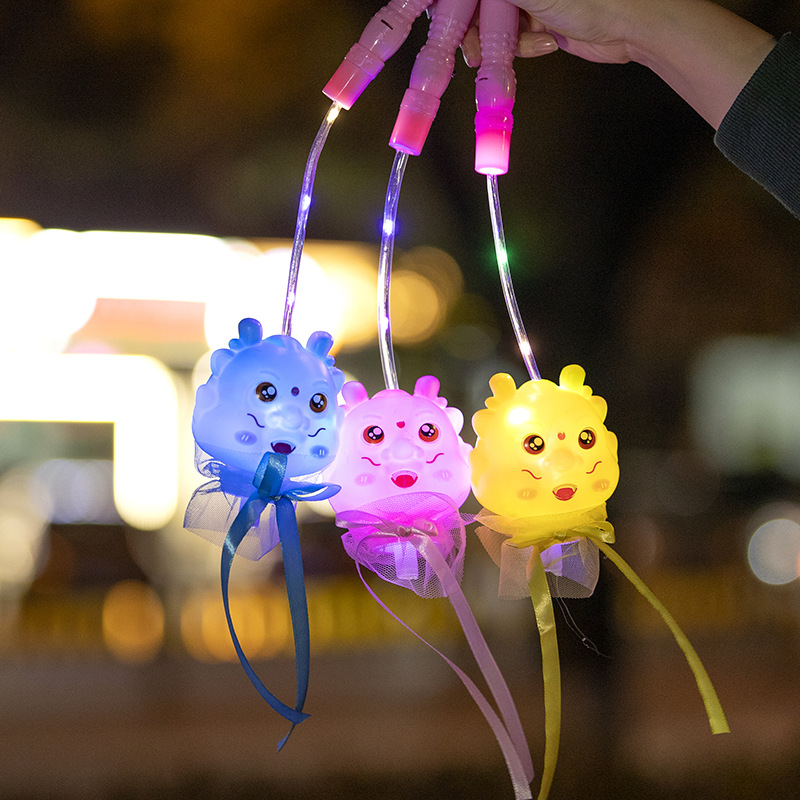 New hand-held lanterns for the Year of the Dragon 2024, featuring little dragon figures, children's luminous toys and flashing lanterns, are available for wholesale at night market stalls Specification image