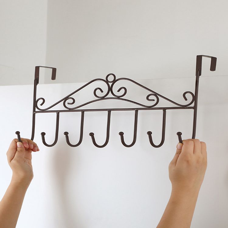 A creative rack for hanging clothes and hats without drilling holes, hooks at the back of the door, nails, clothes hangers on the door, or installation on the back of the door Application Scenario
