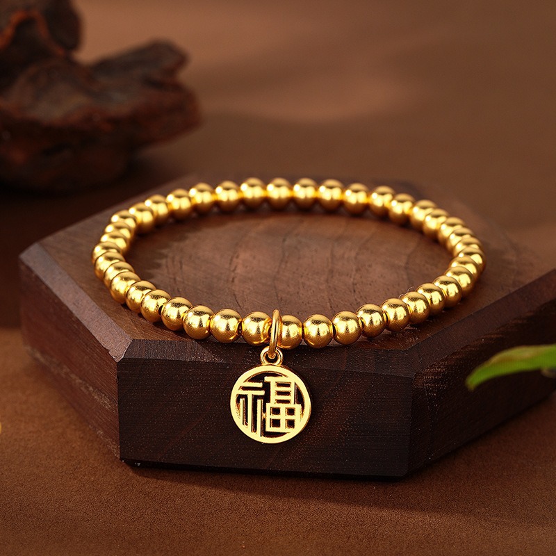 Wholesale jewelry copper gold-plated prayer and blessing pendant bracelets from the manufacturer, bringing continuous good luck and lasting color. Sand gold best-selling bracelets full figure